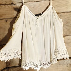 White lace-trimmed bell-sleeve open-shoulder top